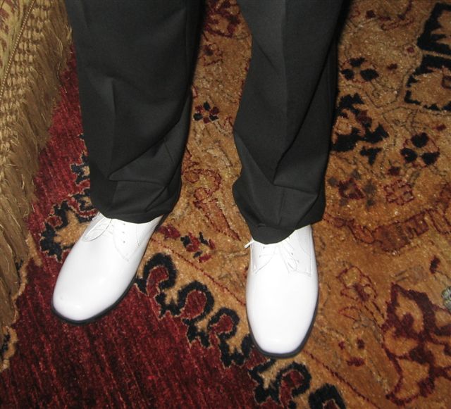 brent's white shoes